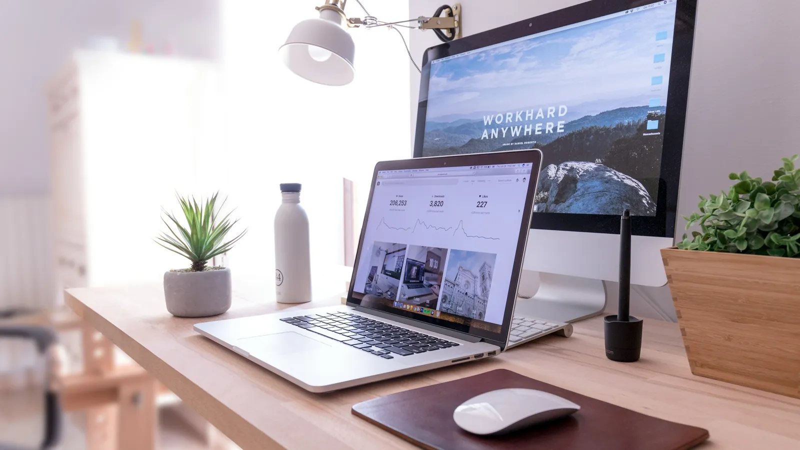 Laptop and desktop computer on a desk