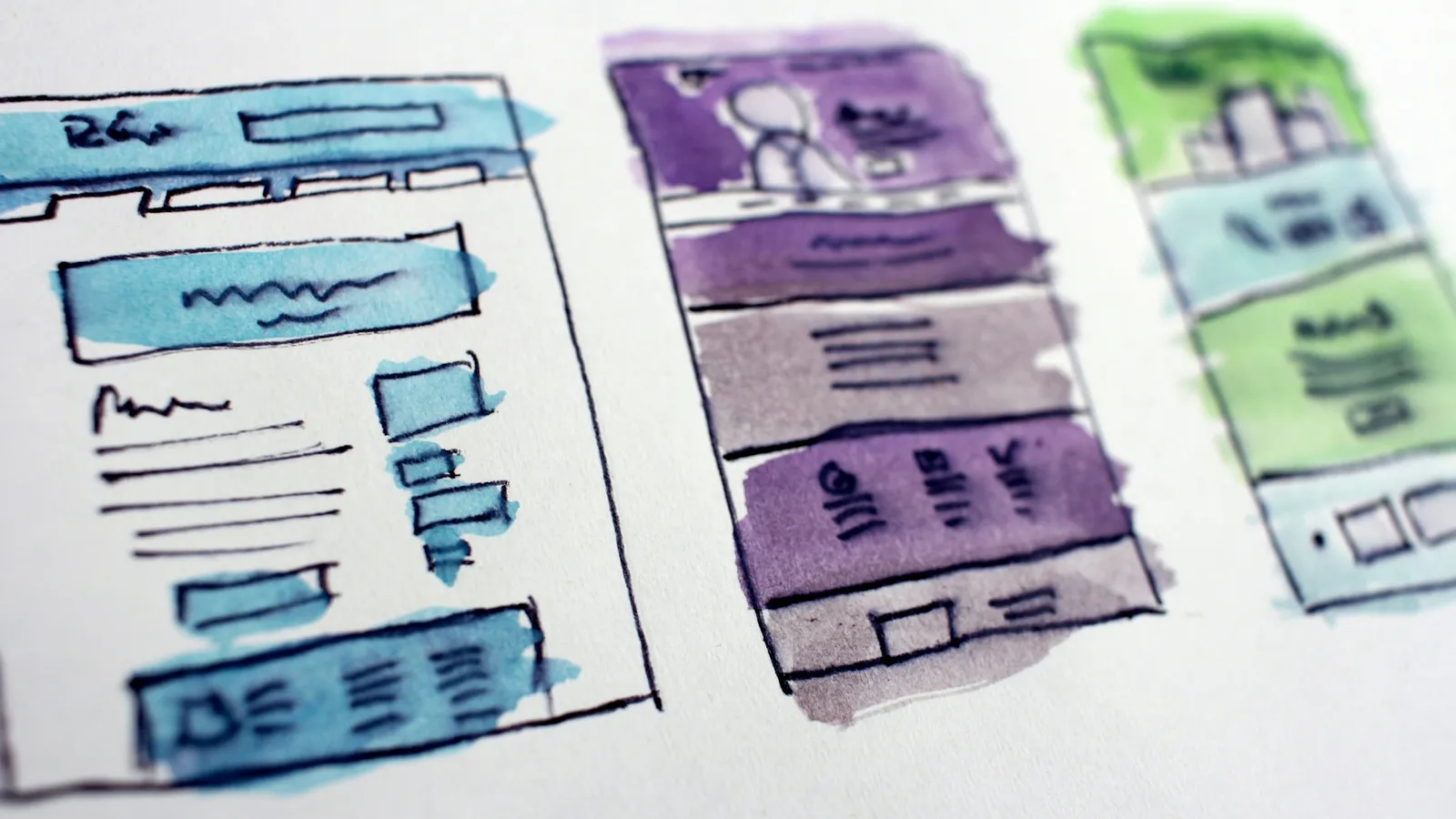Hand drawn wireframe sketches of website page layouts